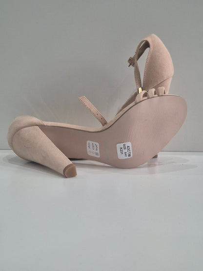 Carvella designer heel